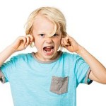 Boy Screaming And Blocking Ears